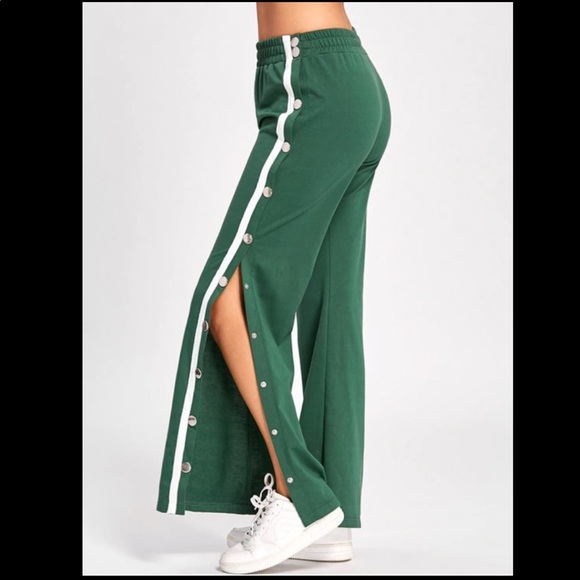 Green track pants. - Picture 1 of 3